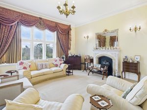 sitting room with fireplace- click for photo gallery